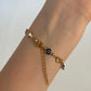 PULSERA OJOS AZUL Y CRISTAL