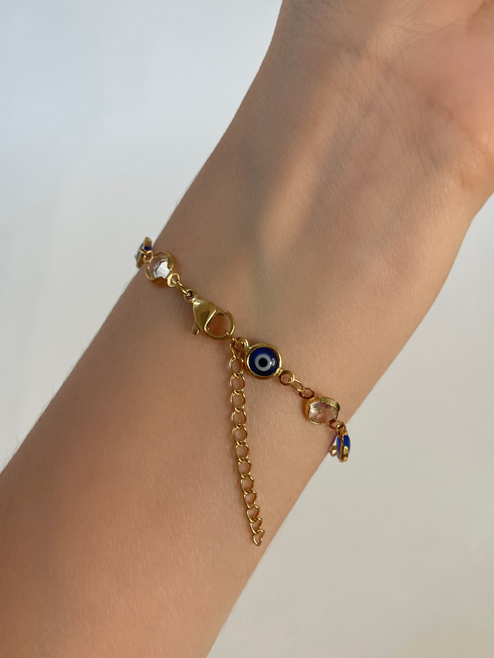 PULSERA OJOS AZUL Y CRISTAL