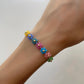 PULSERA FLORES DE COLORES