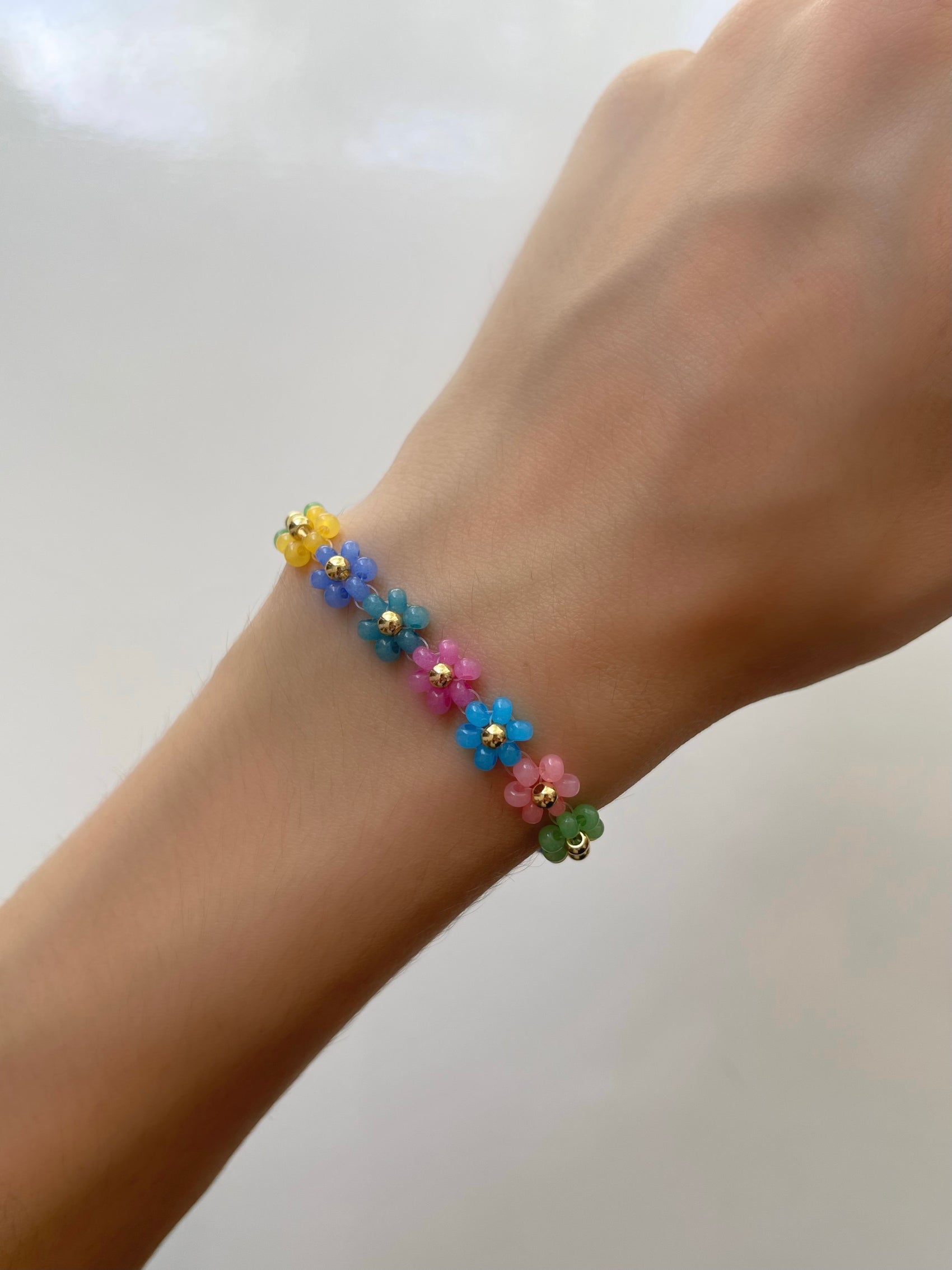 PULSERA FLORES DE COLORES