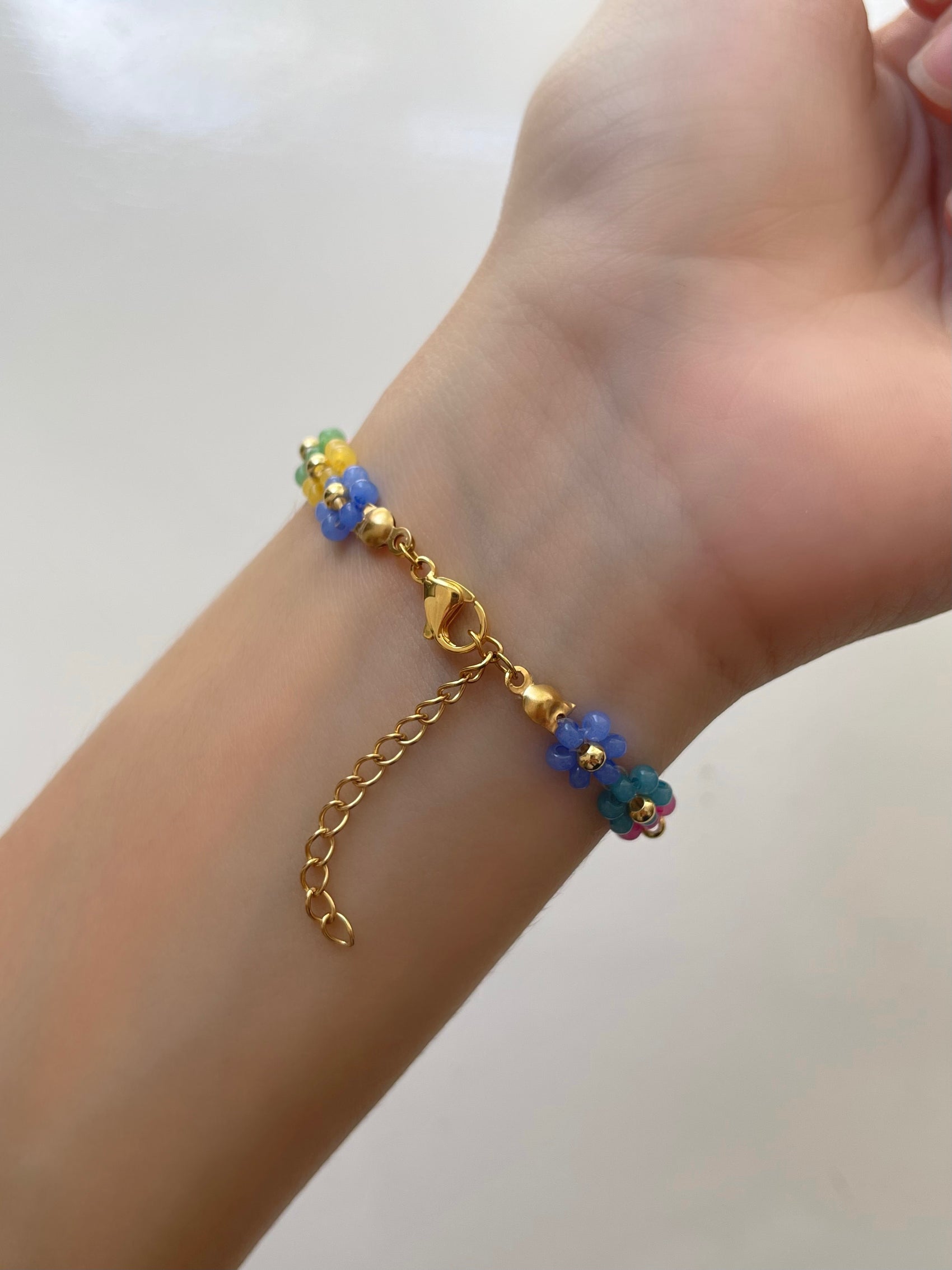 PULSERA FLORES DE COLORES