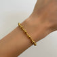 PULSERA BOLITAS DORADAS MIX