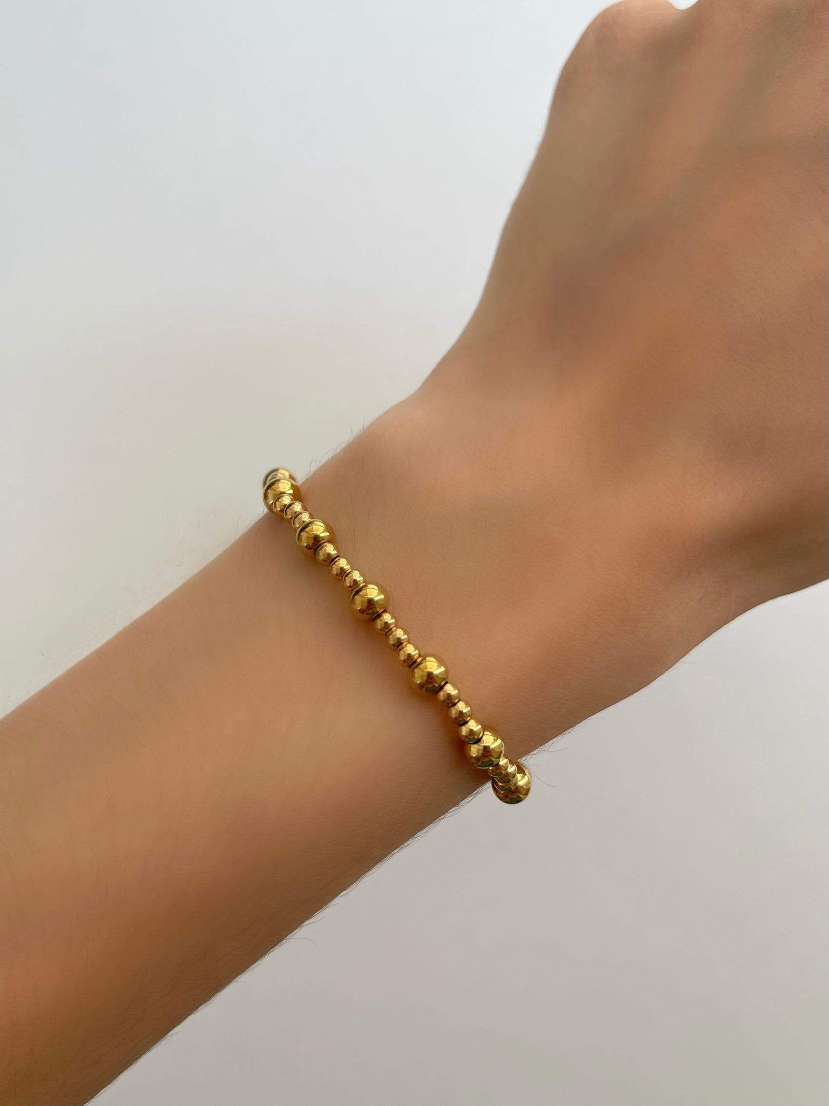 PULSERA BOLITAS DORADAS MIX