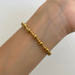 PULSERA BOLITAS DORADAS MIX