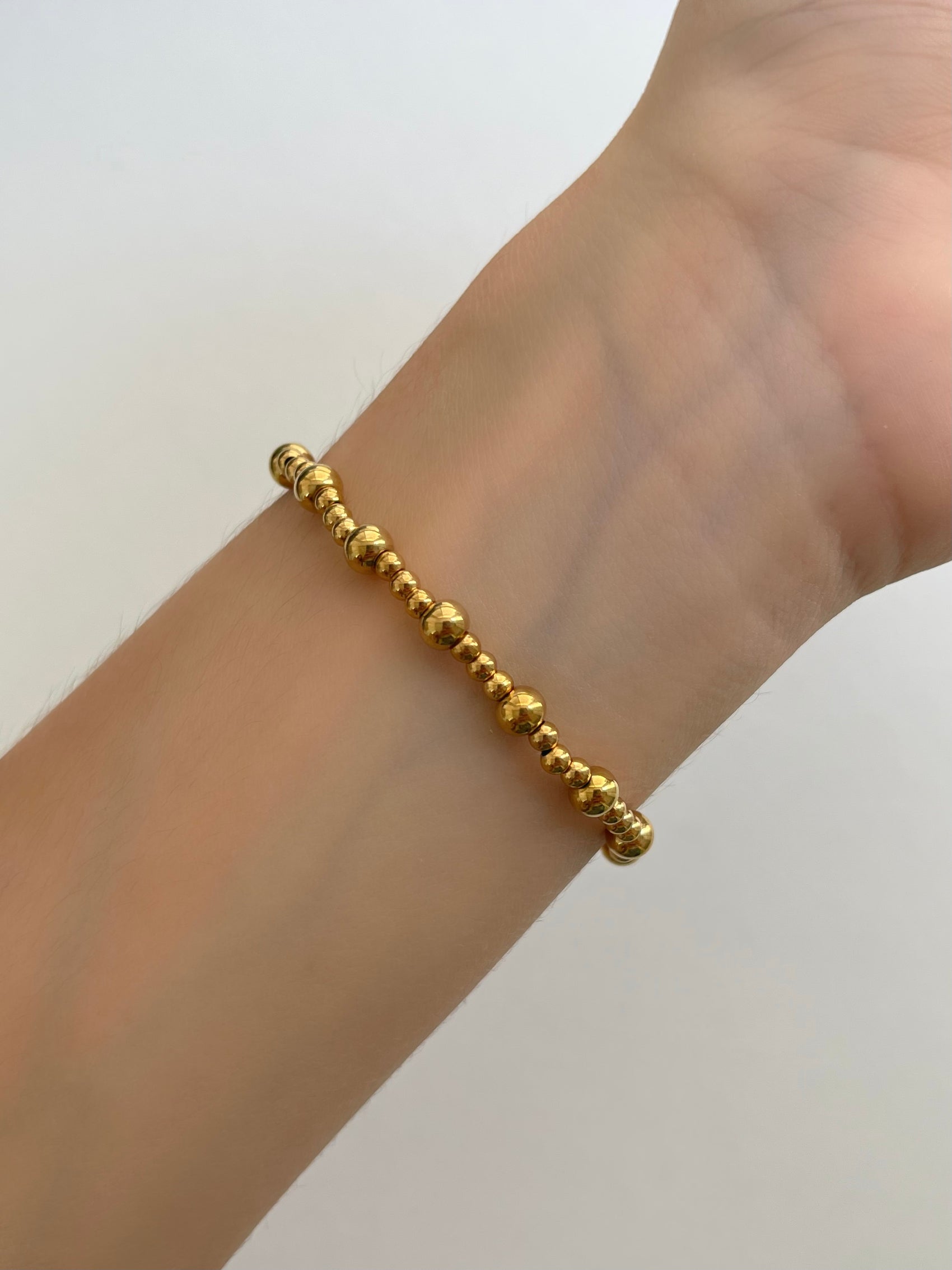PULSERA BOLITAS DORADAS MIX