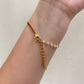 PULSERA MITAD CADENA MITAD PERLITAS