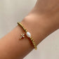 PULSERA PERLA Y CRUZ