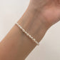 PULSERA PERLAS CON SAN BENITO Y CRUZ