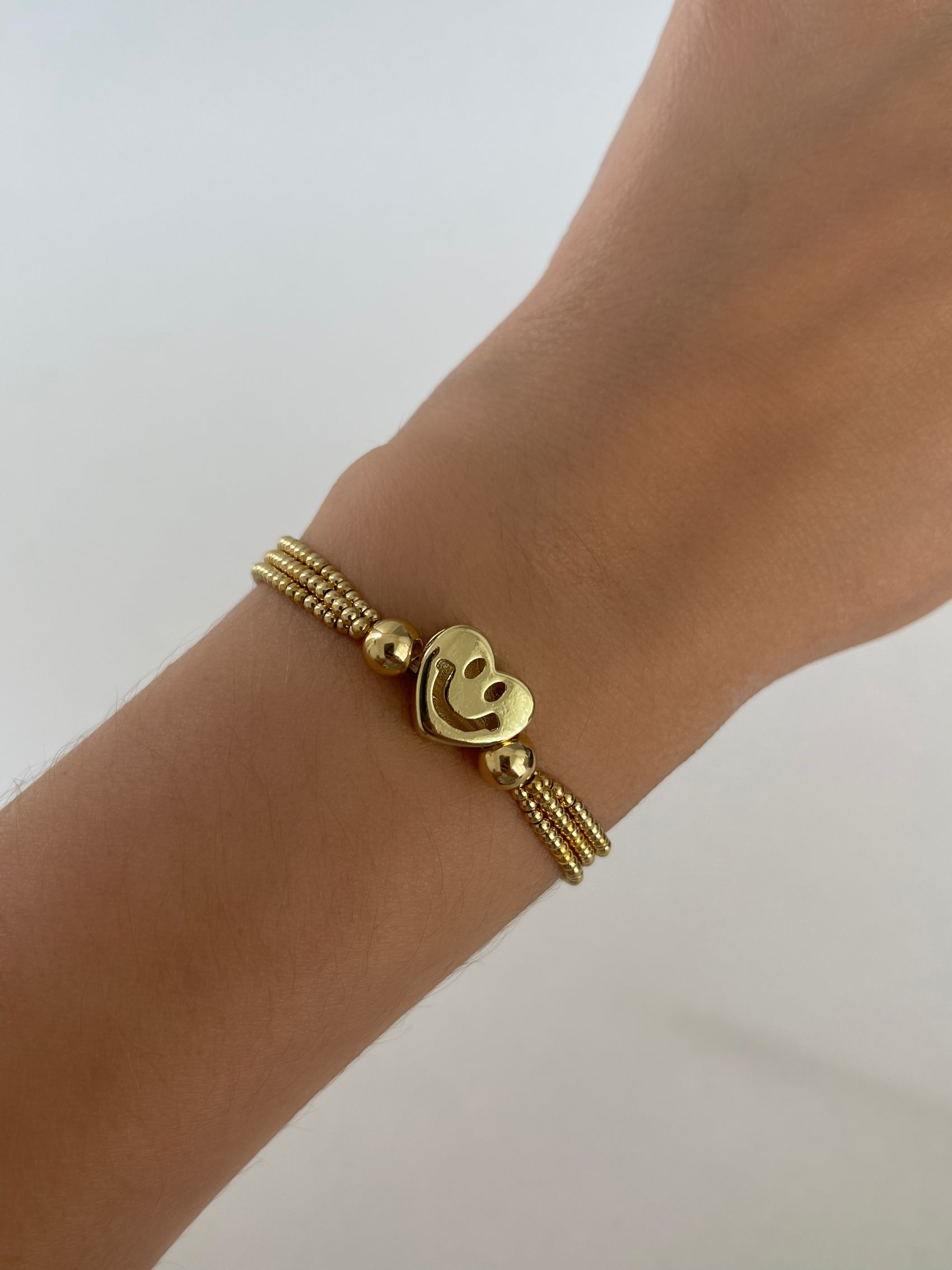 PULSERA TRIPLE CARITA FELIZ