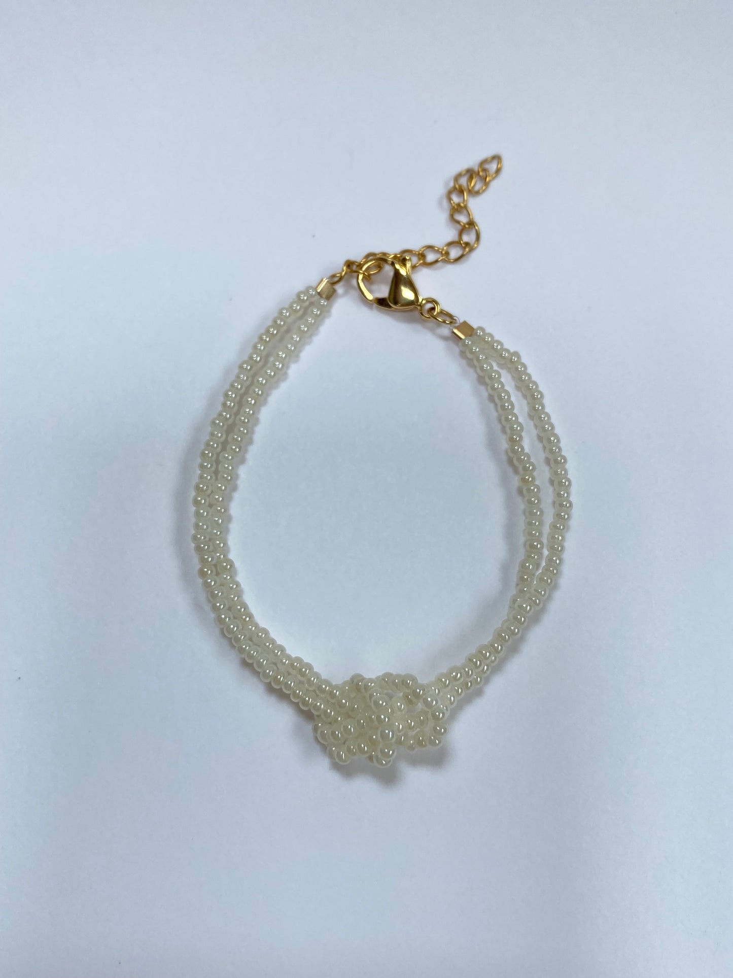 PULSERA NUDO CHAQUIRAS PERLA