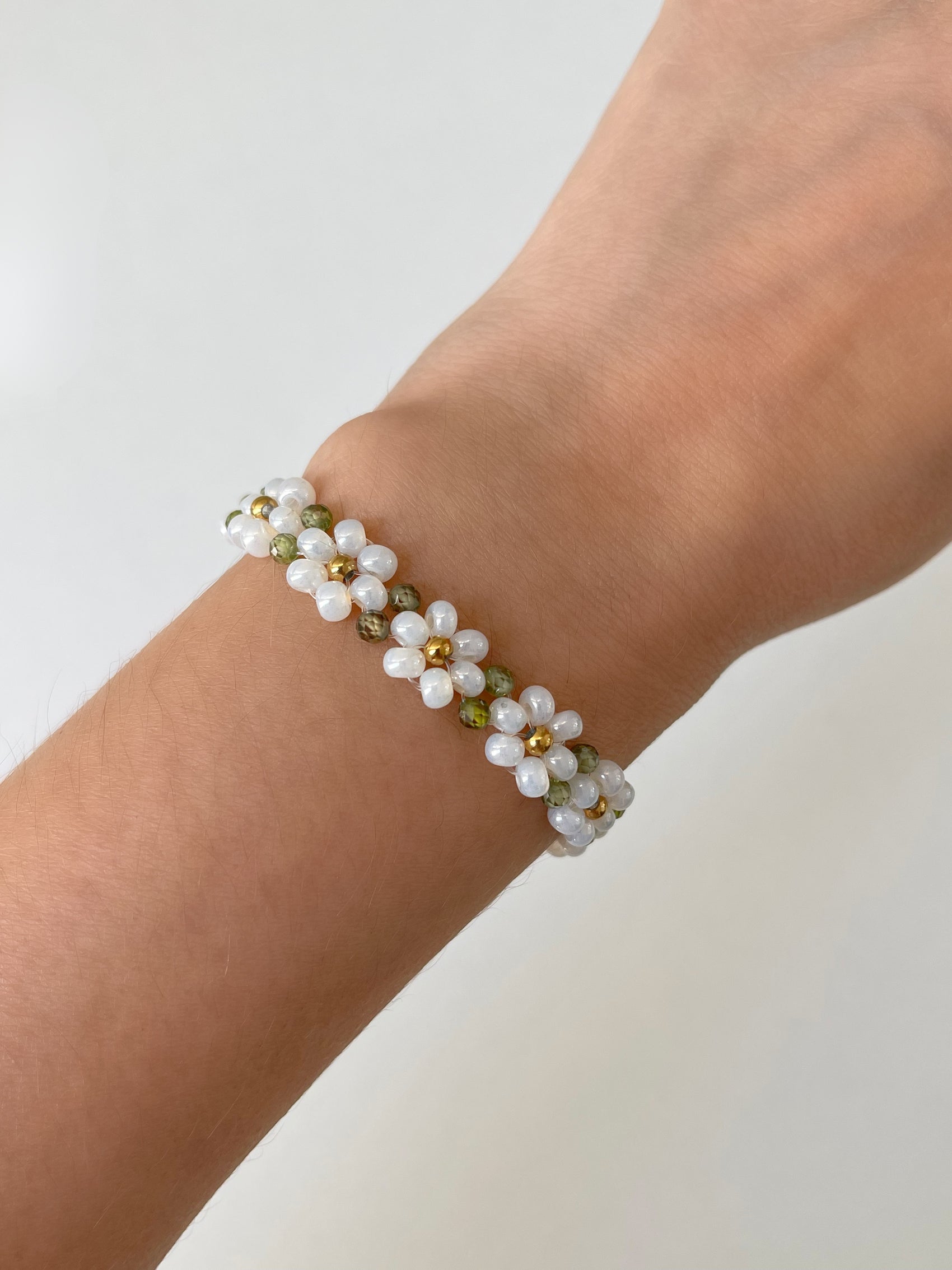 PULSERA FLORES CON ZIRCONIAS