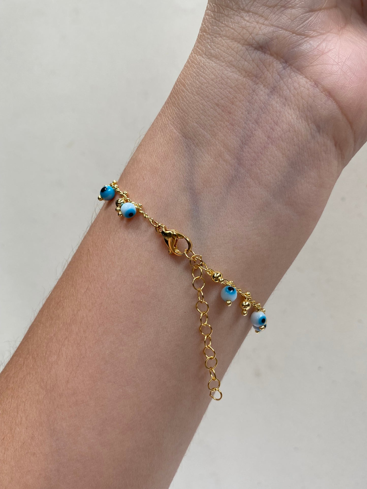 PULSERA OJITOS ESFERA