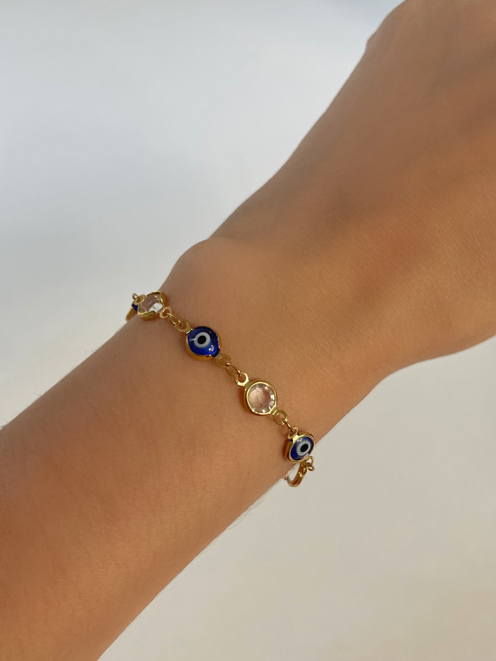 PULSERA OJOS AZUL Y CRISTAL