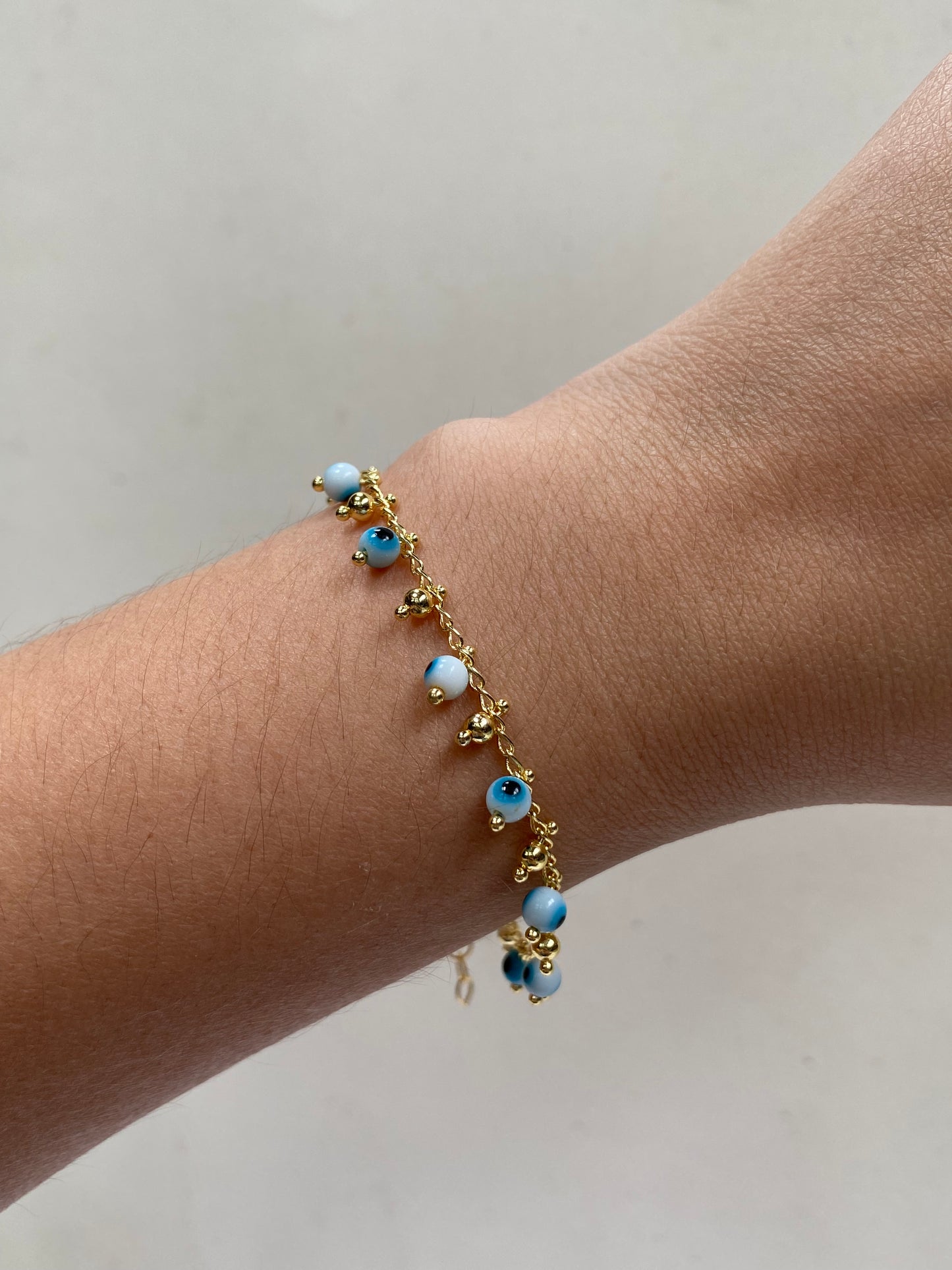 PULSERA OJITOS ESFERA