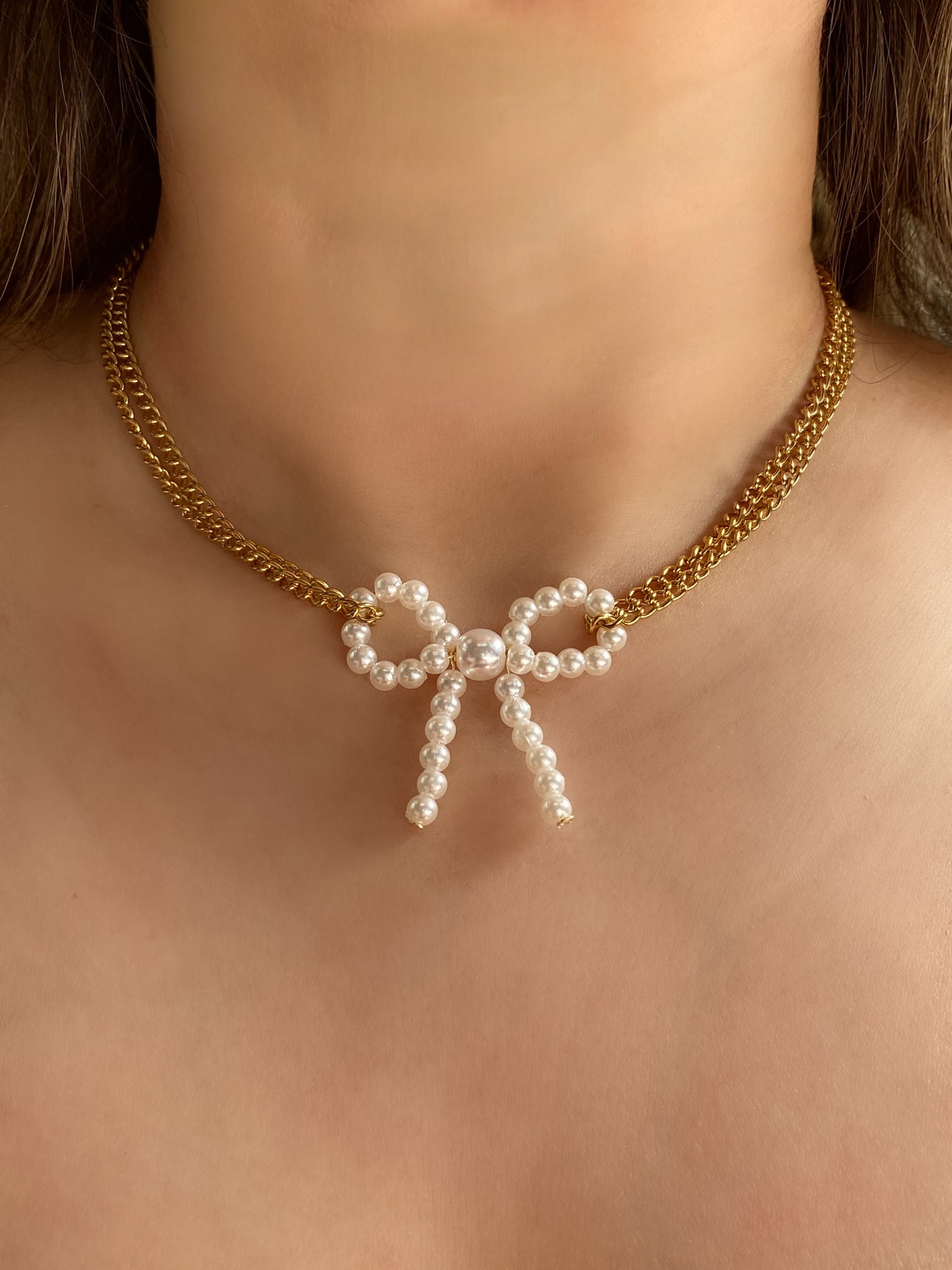 CHOKER DOBLE CON MOÑO PERLAS