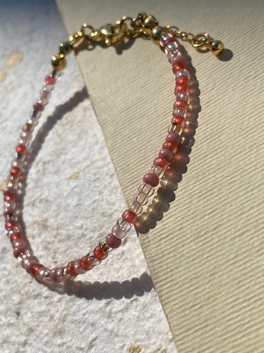 Pulsera piedras rosa y transparente